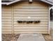 Wall with lock boxes for secure key storage, ensuring convenient access for authorized personnel and peace of mind at 6940 E Girard Ave # 307, Denver, CO 80224
