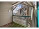 Private balcony with a view of trees and the courtyard at 3845 Canyon Ranch Rd # 104, Highlands Ranch, CO 80126