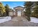 Building exterior with stone facade and entrance at 3845 Canyon Ranch Rd # 104, Highlands Ranch, CO 80126