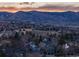 Stunning aerial view of neighborhood homes with majestic mountains in the background at 126 Mc Intyre Circle, Golden, CO 80401