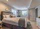 Bedroom with a comfortable bed and bright natural light from the window at 126 Mc Intyre Circle, Golden, CO 80401