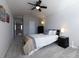 Comfortable carpeted bedroom with vaulted ceiling, ceiling fan, and natural light at 126 Mc Intyre Circle, Golden, CO 80401