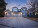 Charming two-story home features a three-car garage and a well-manicured front yard at 126 Mc Intyre Circle, Golden, CO 80401