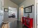 Hallway featuring an ensuite bathroom, and a bedroom visible from the tile flooring at 126 Mc Intyre Circle, Golden, CO 80401
