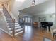 Inviting living room features hardwood floors, a staircase, and ample natural light at 126 Mc Intyre Circle, Golden, CO 80401