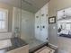 Modern bathroom showcasing a luxurious frameless glass shower with dual showerheads at 126 Mc Intyre Circle, Golden, CO 80401