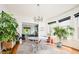 Dining area with chandelier and natural light at 1169 Cook St, Denver, CO 80206