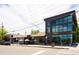 Exterior view of Berenices featuring multiple commercial spaces and modern architecture at 1169 Cook St, Denver, CO 80206