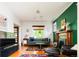 Bright living room featuring a fireplace and stylish decor at 1169 Cook St, Denver, CO 80206