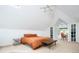 Bright and airy main bedroom featuring vaulted ceilings, dormer windows and a separate sitting area at 1169 Cook St, Denver, CO 80206