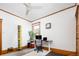 Home office features standing desk and natural light at 1169 Cook St, Denver, CO 80206