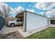 Exterior shot of garage with carport and SUV at 948 S Tennyson St, Denver, CO 80219