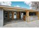 Stylish outdoor kitchen with stainless steel appliances, modern countertops, and ample counter space at 948 S Tennyson St, Denver, CO 80219