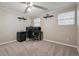 Bedroom with neutral walls, carpet, ceiling fan, and a desk for a functional workspace at 2123 S Joplin Way, Aurora, CO 80013