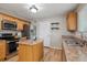 Well-equipped kitchen featuring stainless steel appliances and functional center island at 2123 S Joplin Way, Aurora, CO 80013