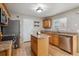 Modern kitchen with stainless steel appliances and a functional center island at 2123 S Joplin Way, Aurora, CO 80013