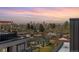 Scenic aerial view of the neighborhood with the city skyline and mountains in the background at 3036 Wilson Ct # 5, Denver, CO 80205