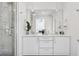 Bright modern bathroom featuring double vanity, undermount sinks, and stylish pendant lighting fixtures at 3036 Wilson Ct # 5, Denver, CO 80205