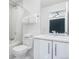 Clean and bright bathroom with a shower and a mirror over the vanity at 3036 Wilson Ct # 5, Denver, CO 80205