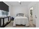 Cozy bedroom with double bed, stylish throw pillows and a window at 3036 Wilson Ct # 5, Denver, CO 80205