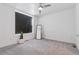 Bright bedroom with modern ceiling fan, large window and spacious layout at 3036 Wilson Ct # 5, Denver, CO 80205