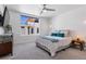 Bright bedroom with large window, ceiling fan, and neutral decor for a relaxing space at 3036 Wilson Ct # 5, Denver, CO 80205