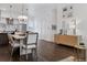 Bright dining area with elegant table and chairs next to a buffet and plenty of natural light at 3036 Wilson Ct # 5, Denver, CO 80205