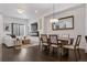 Spacious living room with an open floor plan, dining area, and fireplace at 3036 Wilson Ct # 5, Denver, CO 80205