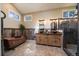 Elegant bathroom with a copper tub, a walk-in shower, and sinks, and rustic wood paneling at 22025 Oehlmann Park Rd, Conifer, CO 80433