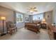 Bedroom with great natural light, wood furnishings, and neutral walls at 22025 Oehlmann Park Rd, Conifer, CO 80433