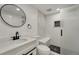 Modern bathroom with a walk-in shower and white finishes at 3582 S Lisbon St, Aurora, CO 80013