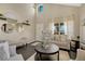 Living room featuring neutral decor and a fireplace at 3582 S Lisbon St, Aurora, CO 80013