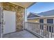 Private balcony with stone wall and white railing at 8200 E 8Th Ave # 2102, Denver, CO 80230