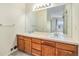 Bathroom with double vanity and large mirror at 8200 E 8Th Ave # 2102, Denver, CO 80230