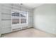 Bright bedroom with built-in shelving and window seat at 8200 E 8Th Ave # 2102, Denver, CO 80230