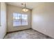 Dining area with tile floor and a view from a large window at 8200 E 8Th Ave # 2102, Denver, CO 80230