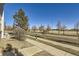 View of street, sidewalk, and landscaping at 8200 E 8Th Ave # 2102, Denver, CO 80230