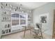 Home office features built-in shelving and a window at 8200 E 8Th Ave # 2102, Denver, CO 80230