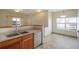 Kitchen features a breakfast nook and updated appliances at 8200 E 8Th Ave # 2102, Denver, CO 80230