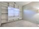 Bright office space featuring built-in shelving and window at 8200 E 8Th Ave # 2102, Denver, CO 80230