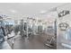 Well-equipped fitness center featuring various machines and weights in a mirrored room with a motivational design at 1625 Larimer St # 1806, Denver, CO 80202