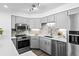 Bright kitchen with stainless steel appliances and stylish backsplash at 1625 Larimer St # 1806, Denver, CO 80202