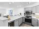 Well-appointed kitchen with stainless steel appliances and quartz countertops at 1625 Larimer St # 1806, Denver, CO 80202