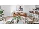Cozy living room showcasing modern furnishings and decor, connecting to an open kitchen with bar seating at 1625 Larimer St # 1806, Denver, CO 80202