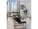 Stylish living room with comfortable seating, city views, and modern decor for a relaxing and inviting space at 1625 Larimer St # 1806, Denver, CO 80202