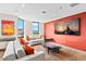 Comfortable living area with modern decor, plush seating and bright accent pillows at 1625 Larimer St # 1806, Denver, CO 80202