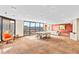 Bright living area features large windows with panoramic views of the cityscape and mountains at 1625 Larimer St # 1806, Denver, CO 80202