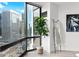 Bright living room boasting expansive windows with city views and a modern, minimalist design at 1625 Larimer St # 1806, Denver, CO 80202