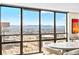 Living area with expansive windows offering stunning city and mountain views at 1625 Larimer St # 1806, Denver, CO 80202
