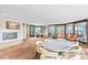 Relaxing lounge area with fireplace and comfortable seating near the outdoor pool at 1625 Larimer St # 1806, Denver, CO 80202
